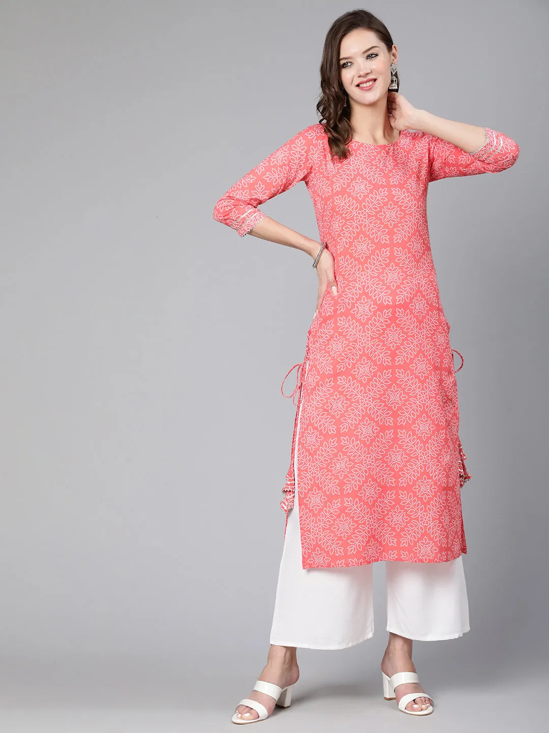 Women Pink Bandhani Printed Straight Kurta With Three Quarter Sleeves